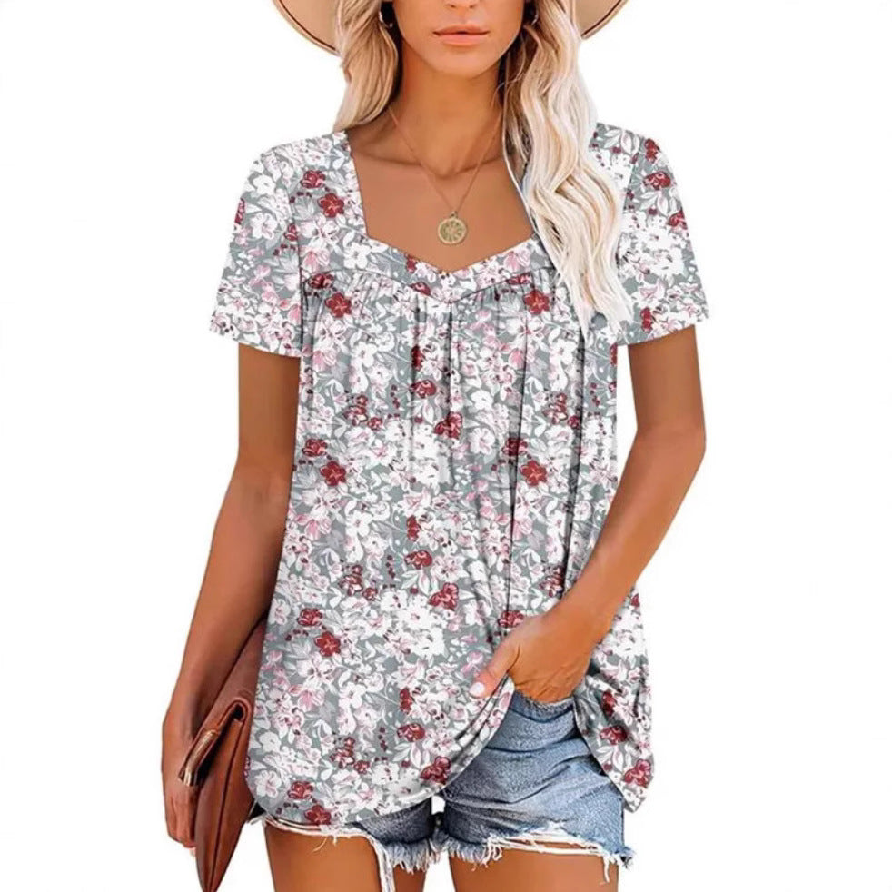 Dame afslappet blomster-top med V-hals og løs pasform Stilla