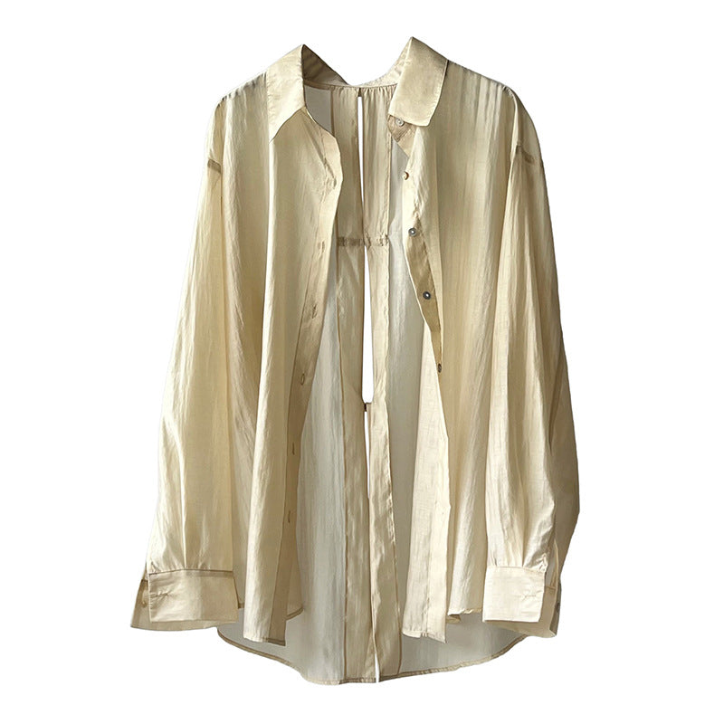 Dame afslappet bluse med dekorativt bindebånd og innovativ detalje på ryggen Stilla