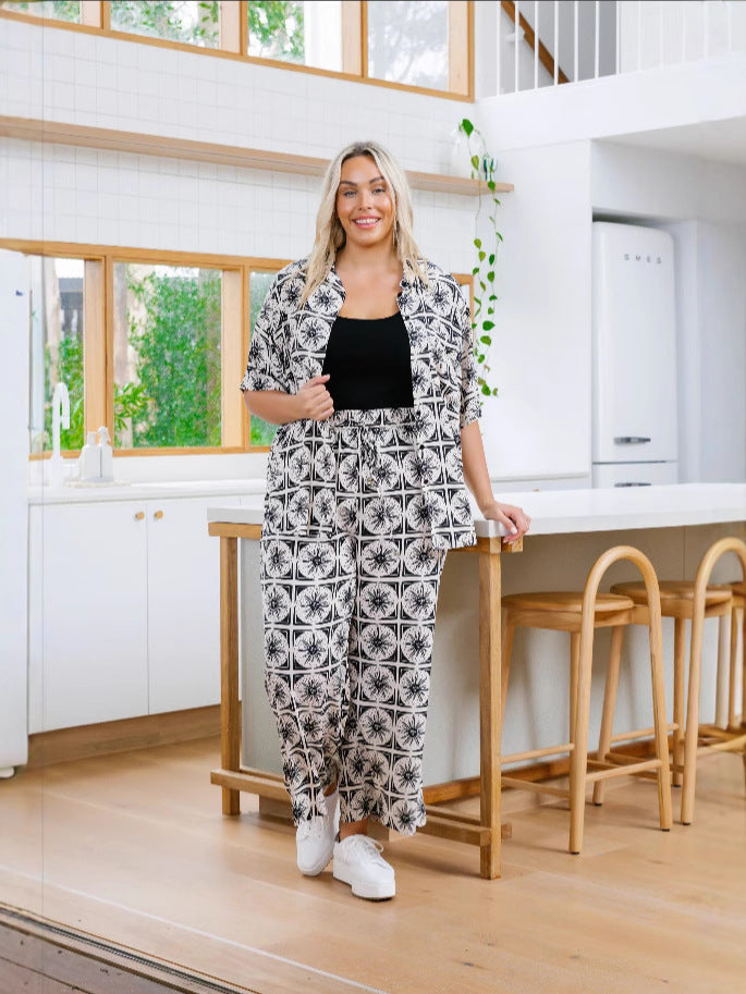 Dame Løs Jumpsuit med blomsterprint og praktiske lommer Stilla