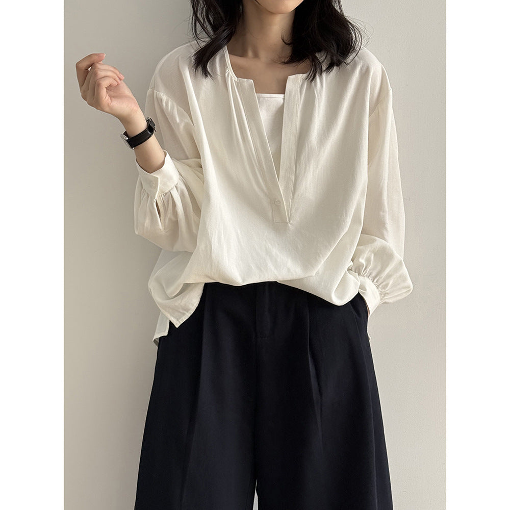 Dame afslappet bluse med ståkrave og elegant knappemulighed Stilla