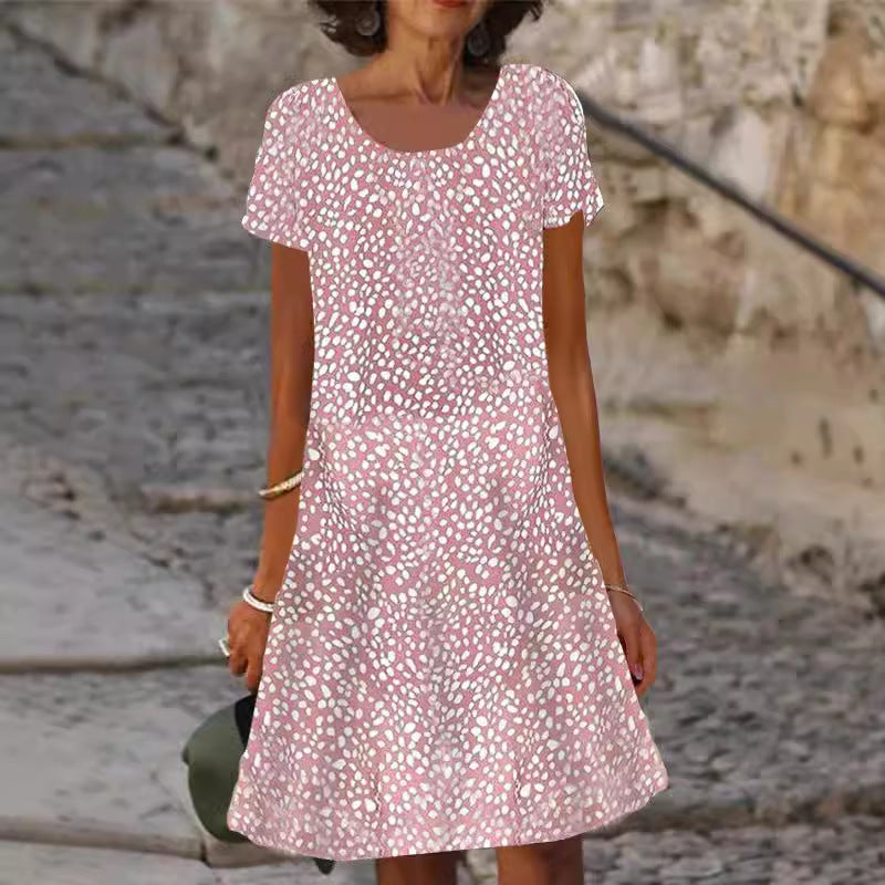 Dame afslappet halværmet kjole med blomstermønster og flatterende snit Stilla