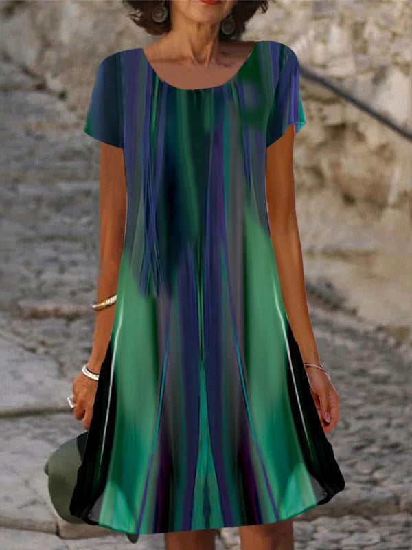 Dame afslappet halværmet kjole med blomstermønster og flatterende snit Stilla