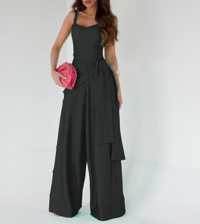 Dame bredt jumpsuit med elegante draperinger og stropper Stilla