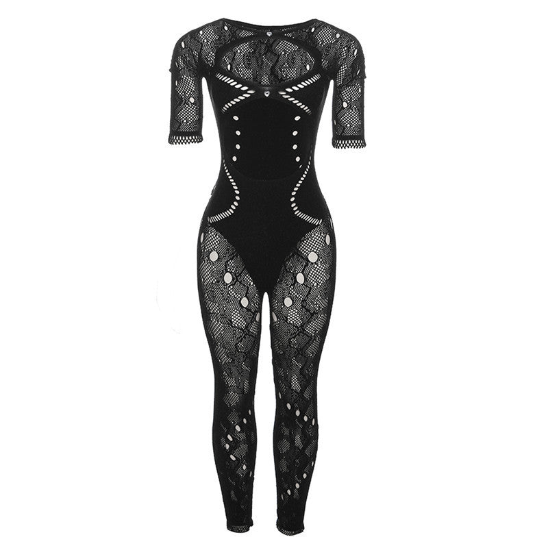 Damer net-jumpsuit med kreative cut-outs og dekorative detaljer Stilla
