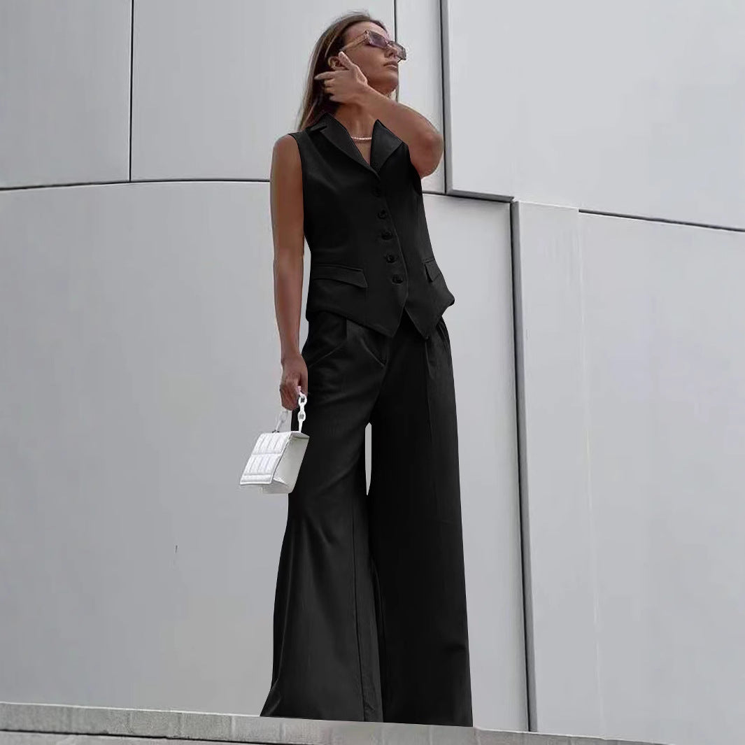 Dame jumpsuit med ærmeløs blazer og vide bukser Stilla