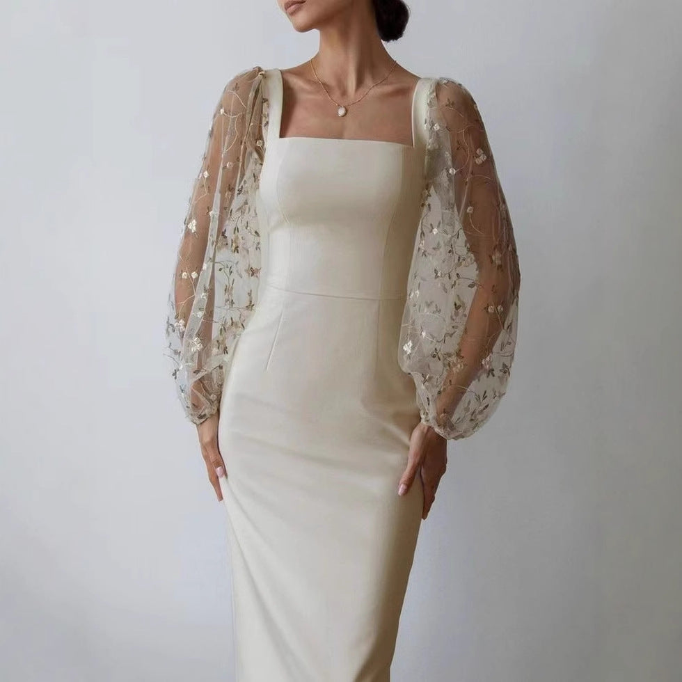 Dame Elegant aftenkjole med gennemsigtige, broderede ærmer Stilla