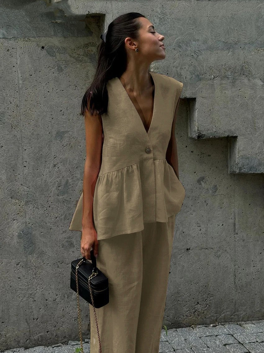 Dame luftig jumpsuit med elegant V-udskæring og taljering Stilla