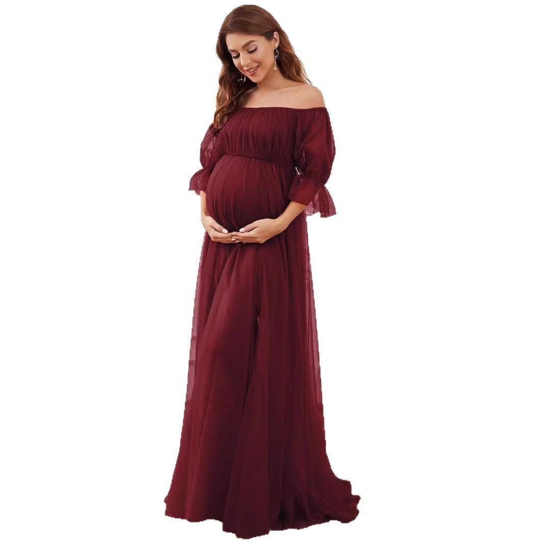 Dame Elegant gravidkjole med off-shoulder design og luftig tyl Stilla
