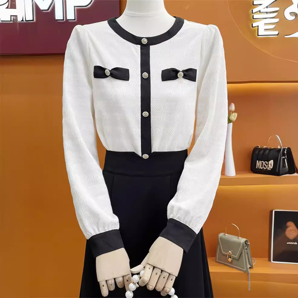 Dame elegant bluse med dekorative sløjfer og knapdetaljer Stilla