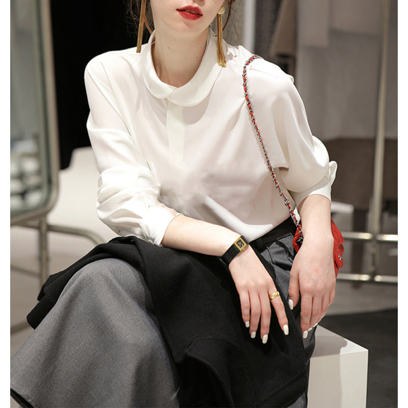 Dame elegant bluse med klassisk bubikræft og fin stofstruktur Stilla