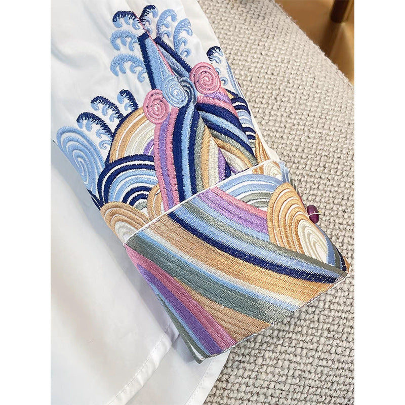 Dame eksklusiv langærmet bluse med kunstnerisk broderedesign og moderne accenter Stilla