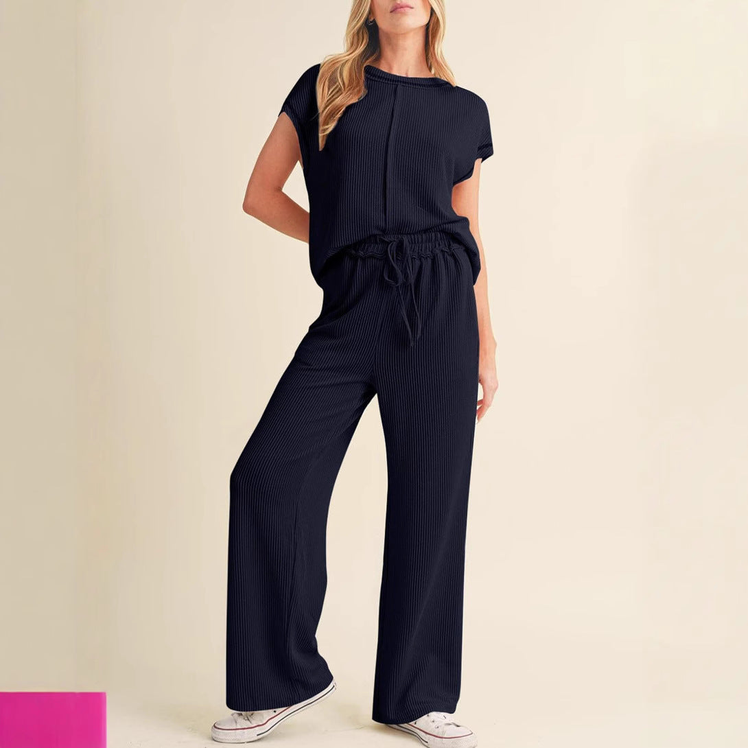 Dame Komfortabel og moderigtigt jumpsuit med brede ben og elastisk talje Stiila