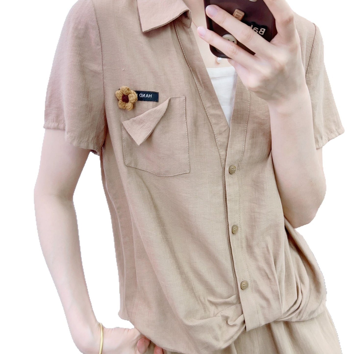 Dame afslappet jumpsuit med knapbart overdel og elegant taljebehandling Stilla