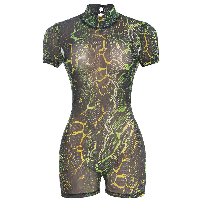 Dame figursyet kort jumpsuit med høj krave og blomstret design Stilla