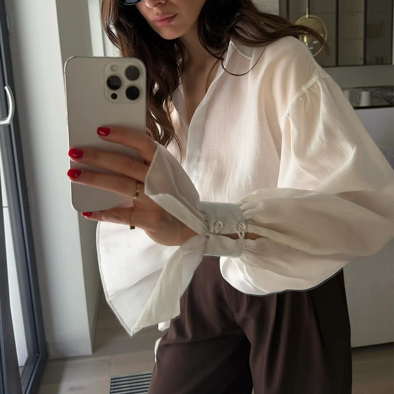 Dame Elegant Bluse med voluminøse Puffærmer og fint Strukturdesign Stilla