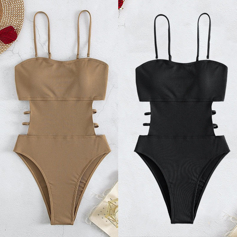 Dame jumpsuit badedragt med side cut-outs og justerbare spaghetti-stropper Stilla