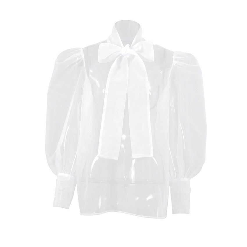 Dame transparent bluse med elegant bue dekoration og voluminøse ærmer Stilla