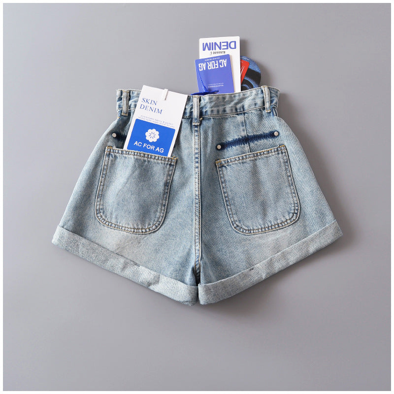 Dame Denim-shorts med frynset detaljer og elastisk talje Stilla