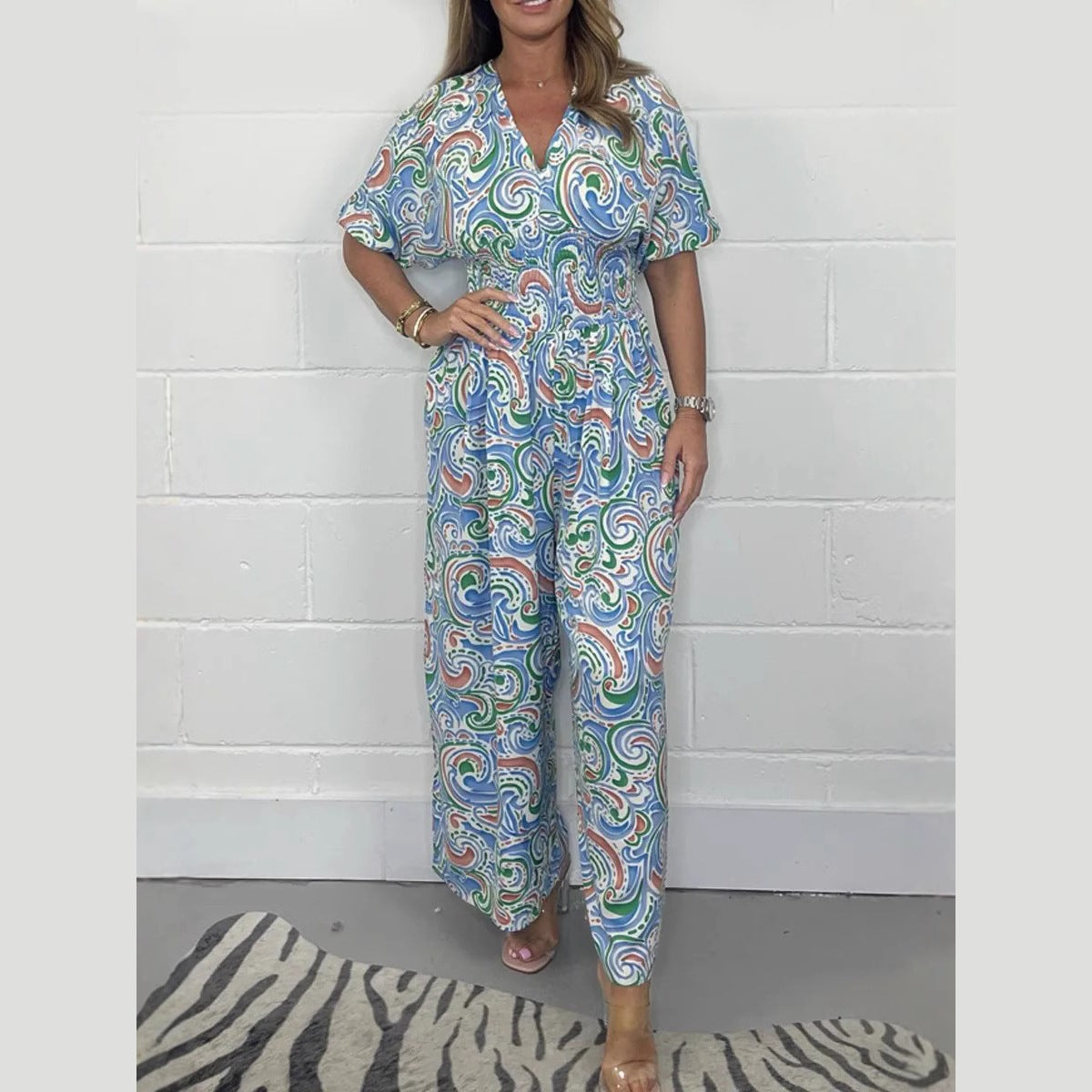 Dame Elegant Jumpsuit med brede ben og dyb V-hals Stilla