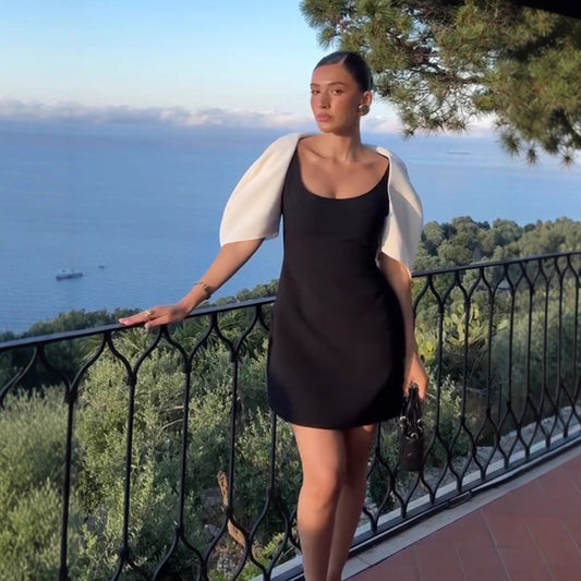 Dame Elegant kjole med skulderfri design og voluminøse ærmer Stilla