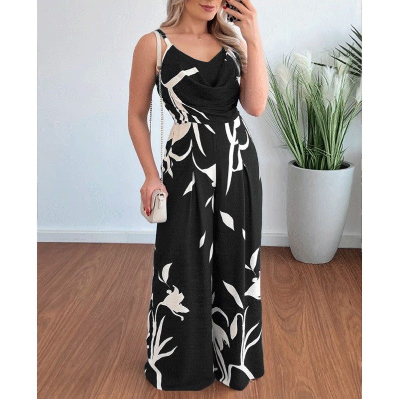 Dame jumpsuit med flydende snit og dekorative blomster motiver Stilla