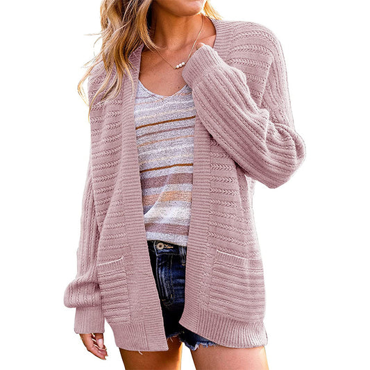 Dame strik cardigan med struktureret design og praktiske lommer Stilla