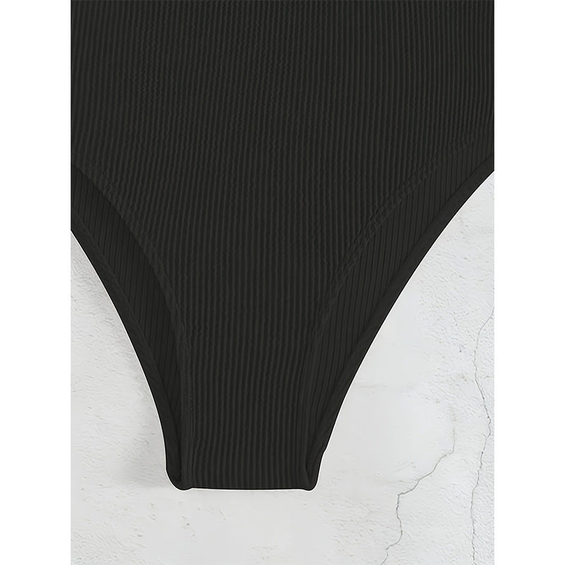 Dame Elegant Éntpiece-Svømmetøj med dyb V-udskæring og modiske bindedetaljer Stilla