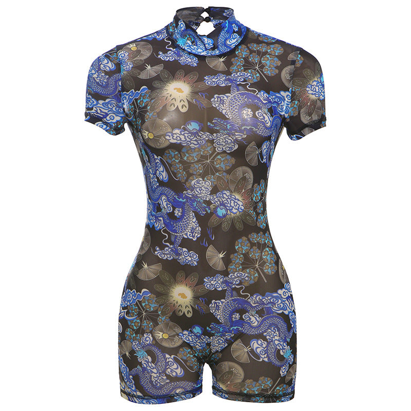 Dame figursyet kort jumpsuit med høj krave og blomstret design Stilla