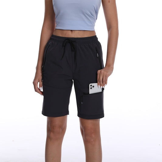 Dame Sporty shorts med praktiske lynlåslommer og justerbar talje Stilla