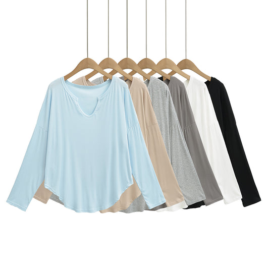 Dame afslappet longsleeve top med dyb v-hals og løstsiddende snit Stilla