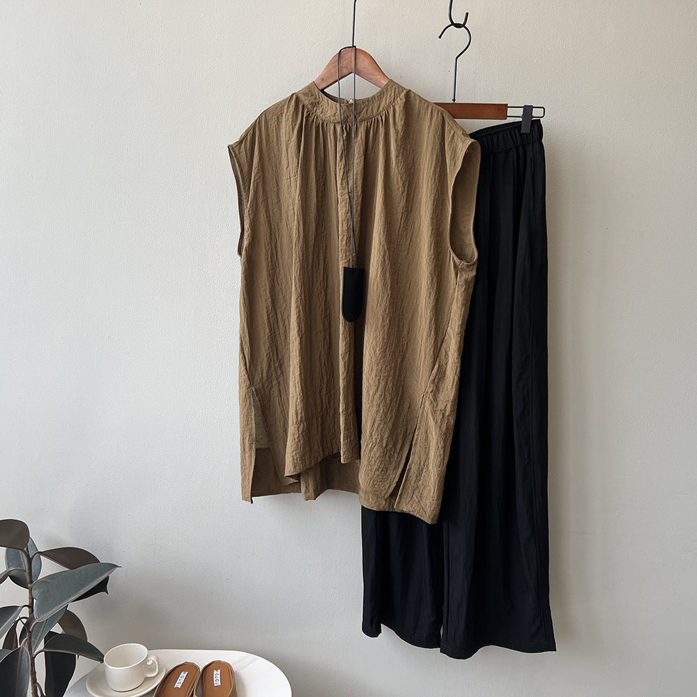 Dame afslappet langærmet top med fin plisseret lukning og V-hals Stilla