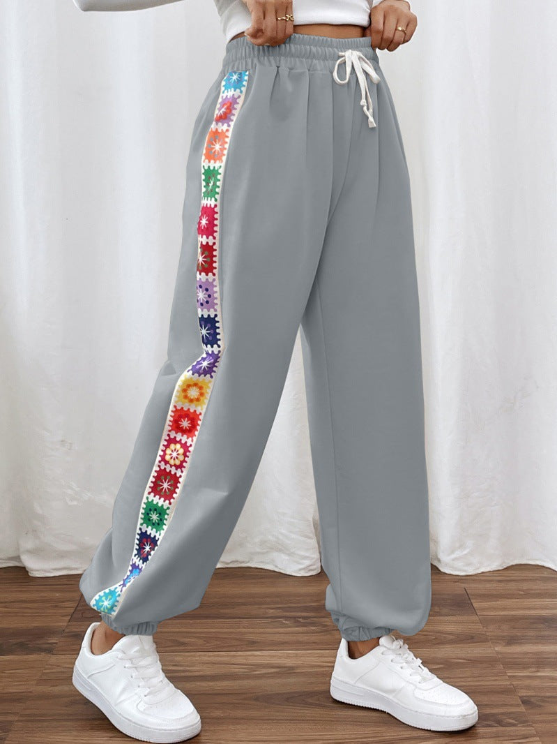 Dame joggingbukser med floral sidebånd Stilla