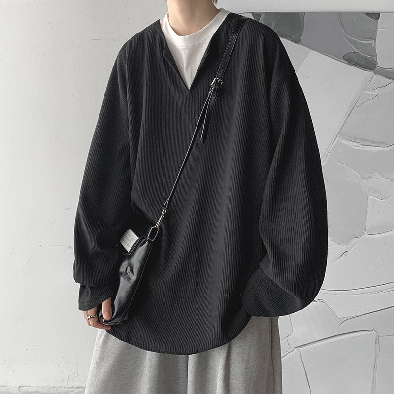 Dame afslappet oversized pullover med struktureret design og moderne V-udskæring Stilla