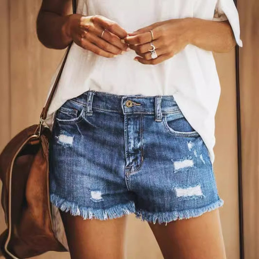 Dame Destroyed Denim-Shorts med afslappet frynseafslutning Stilla