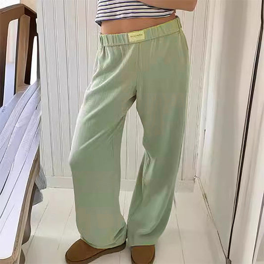 Dame afslappede Palazzo-bukser lavet af let, åndbart stof med elastisk talje Stilla