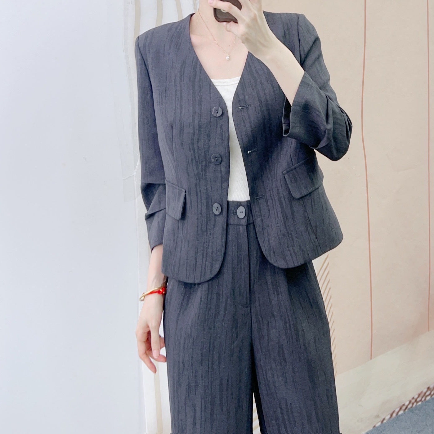 Dame elegant blazer-bukser sæt med smal pasform og dekorative knapdetaljer Stilla