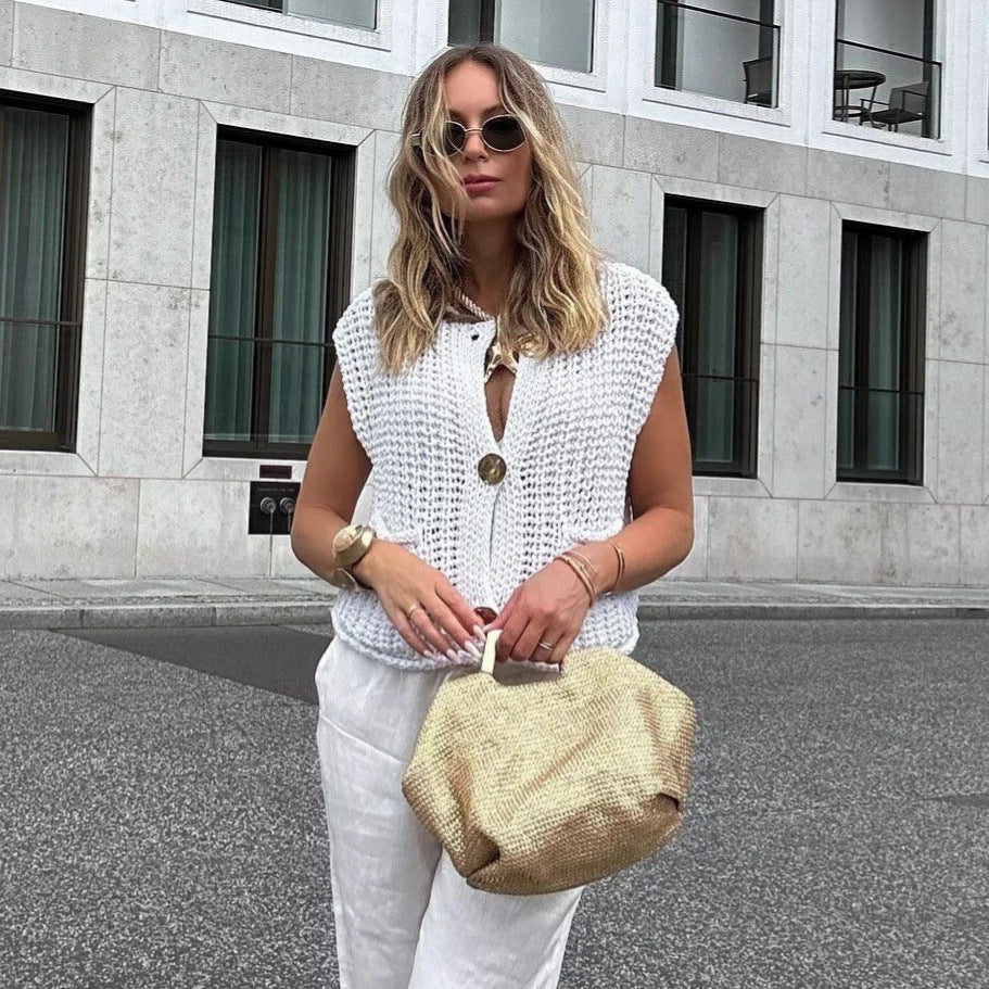 Dame strikvest med praktiske lommer og elegante knapdetaljer Stilla