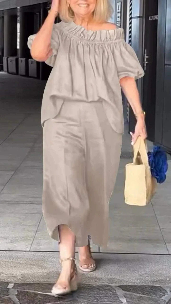 Dame luftig jumpsuit-sæt med voluminøse ærmer og raffineret taljering Stilla