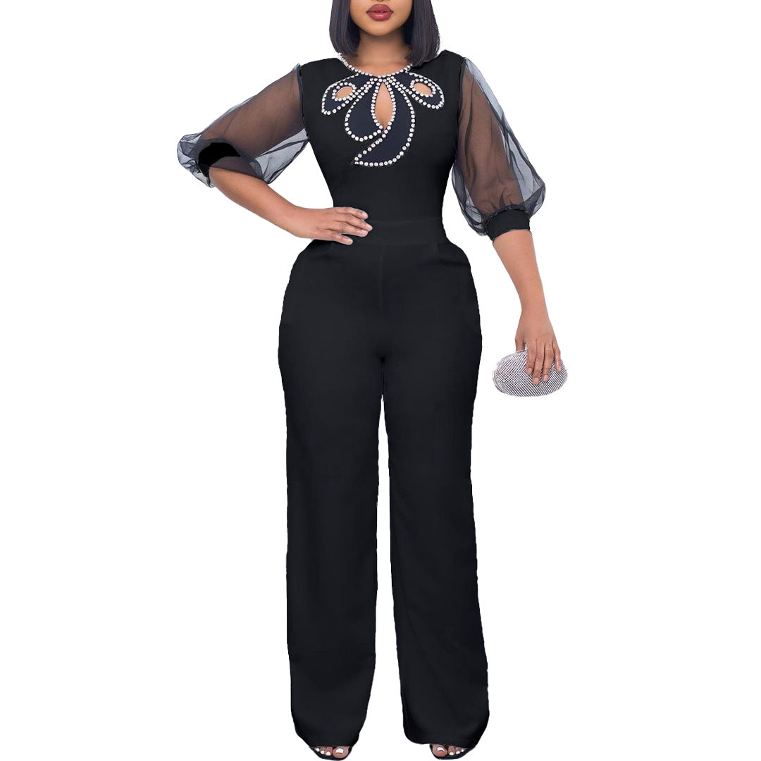 Dame Elegante Jumpsuit med gennemsigtige ærmer og smykker detaljer Stilla