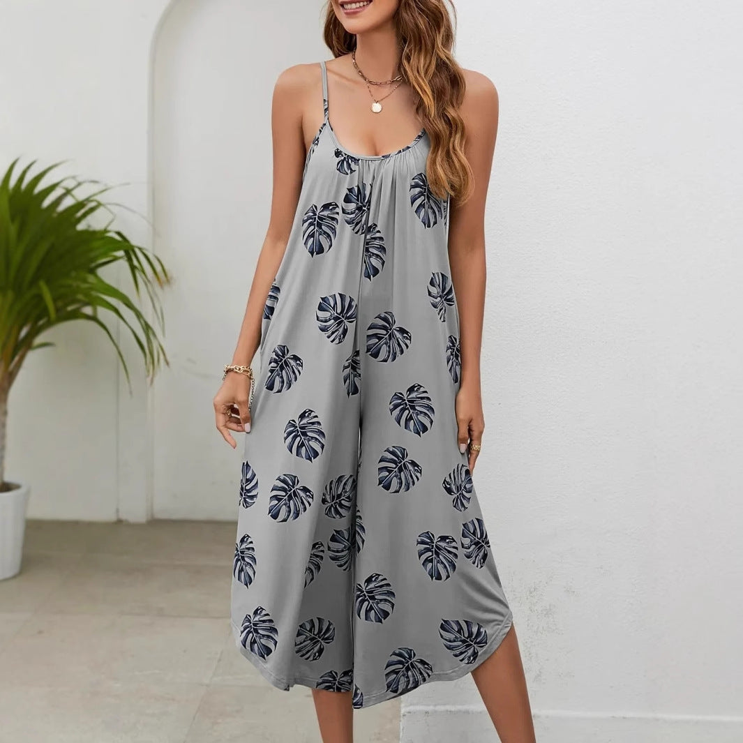Dame luftig sommer jumpsuit med blomsterprint og lommer Stilla