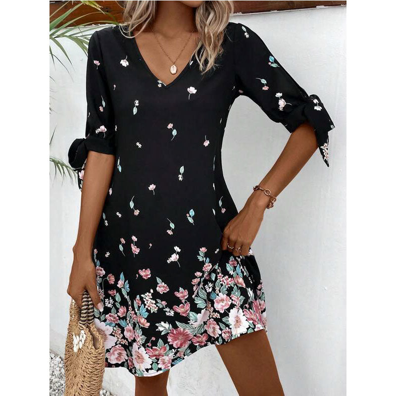 Dame afslappet blusekjole med floral design og loopærmer Stilla