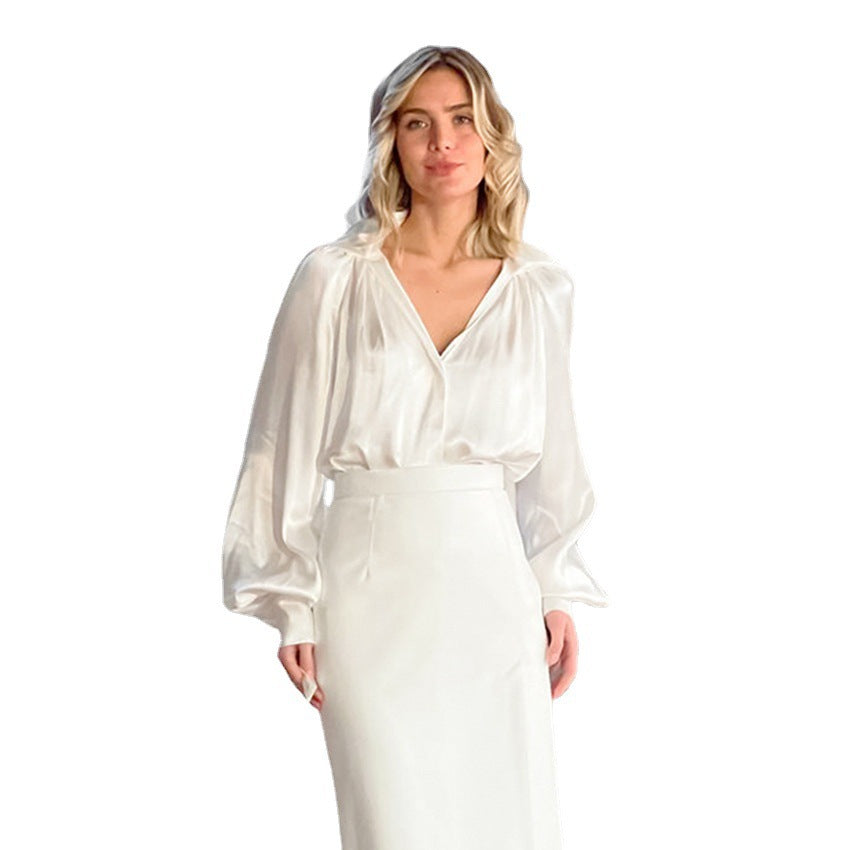Dame elegant bluse med voluminøse ærmer og dyb v-hals Stilla