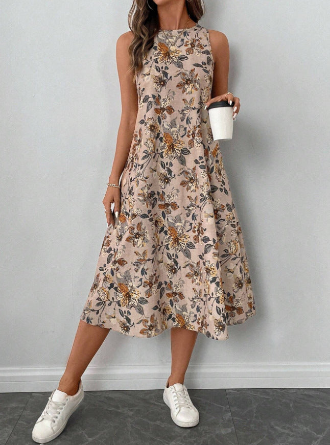 Dame afslappet blomsterkjole med lommer og svajende kant Stilla