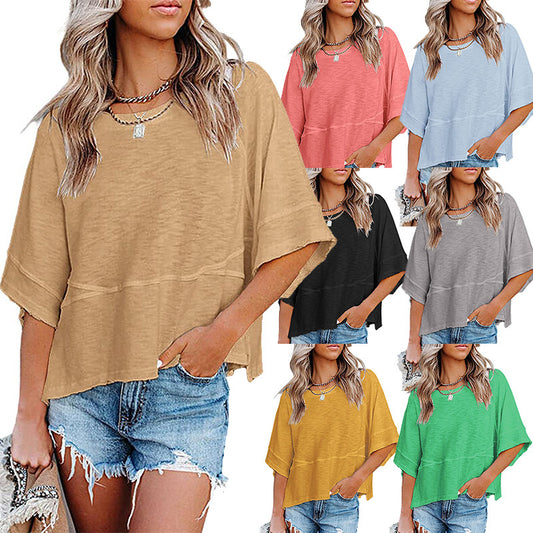 Dame afslappet oversized T-shirt med løs pasform og minimalistisk æstetik Stilla