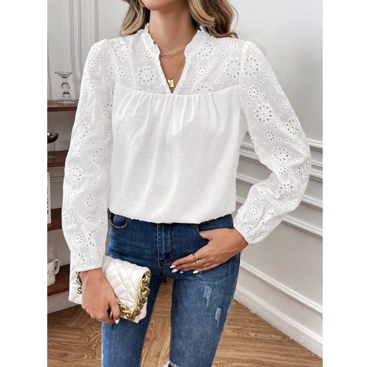 Dame elegant bluse med florale hulmønstre og pufærmer Stilla