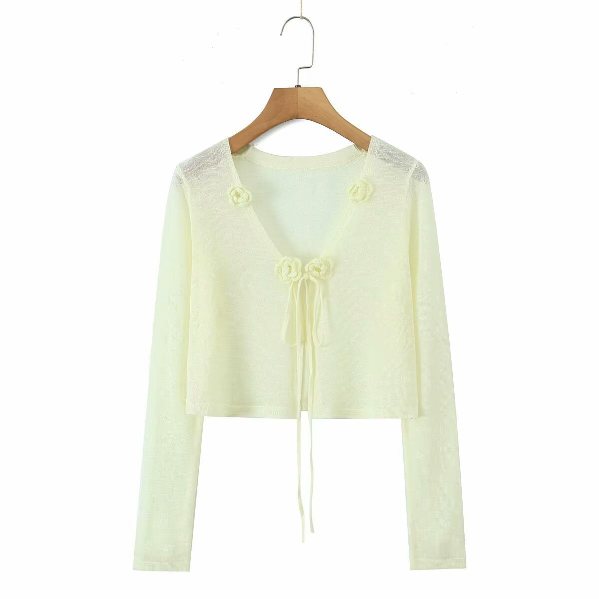 Dame cropped strikjakke med blomstrede accenter og elegant bindebånd Stilla