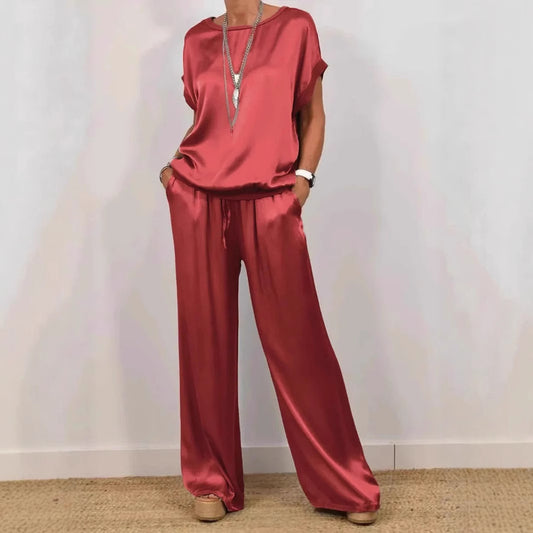 Dame Elegant sæt med afslappet bluse og løst skåret bukser Stilla