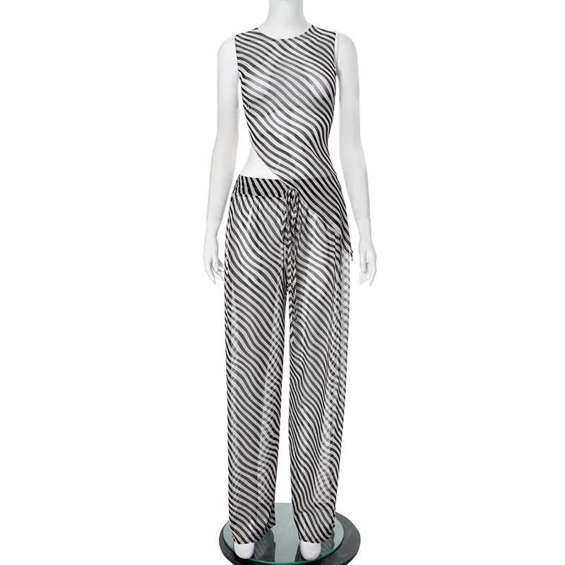 Dame stilfuld jumpsuit med asymmetrisk snit og stribemønster Stilla
