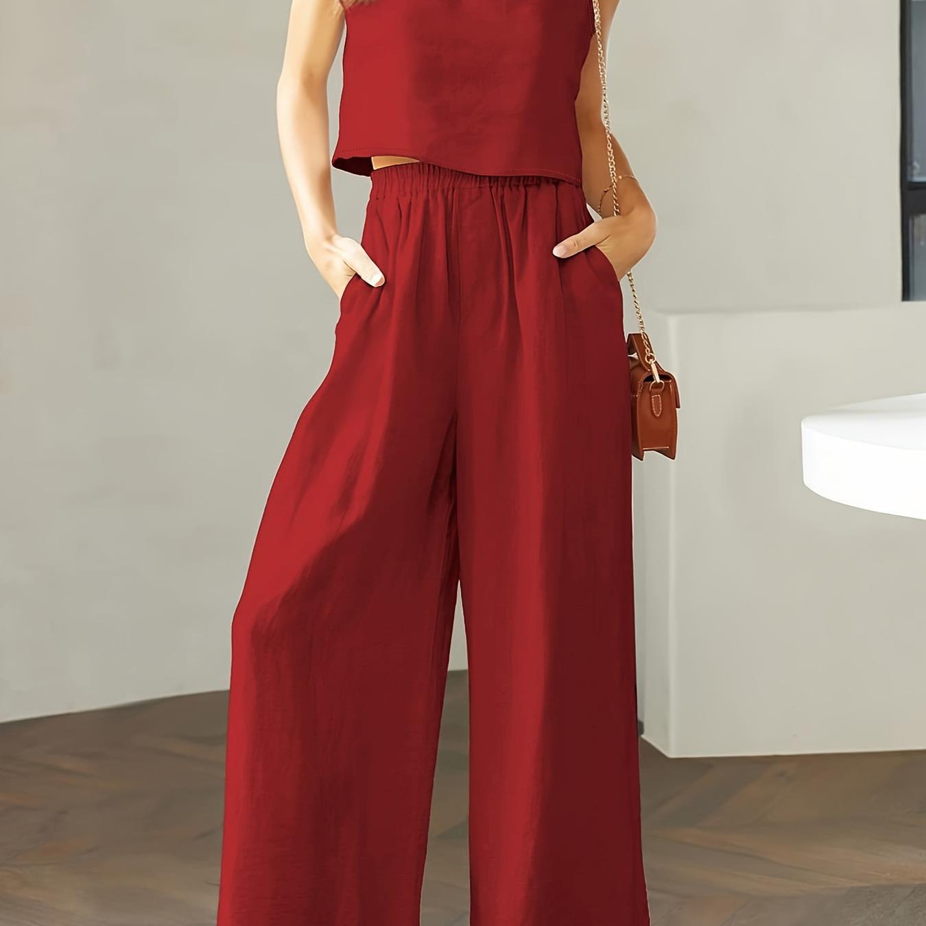 Dame bred jumpsuit med elegant snit og elastisk taljebånd Stilla