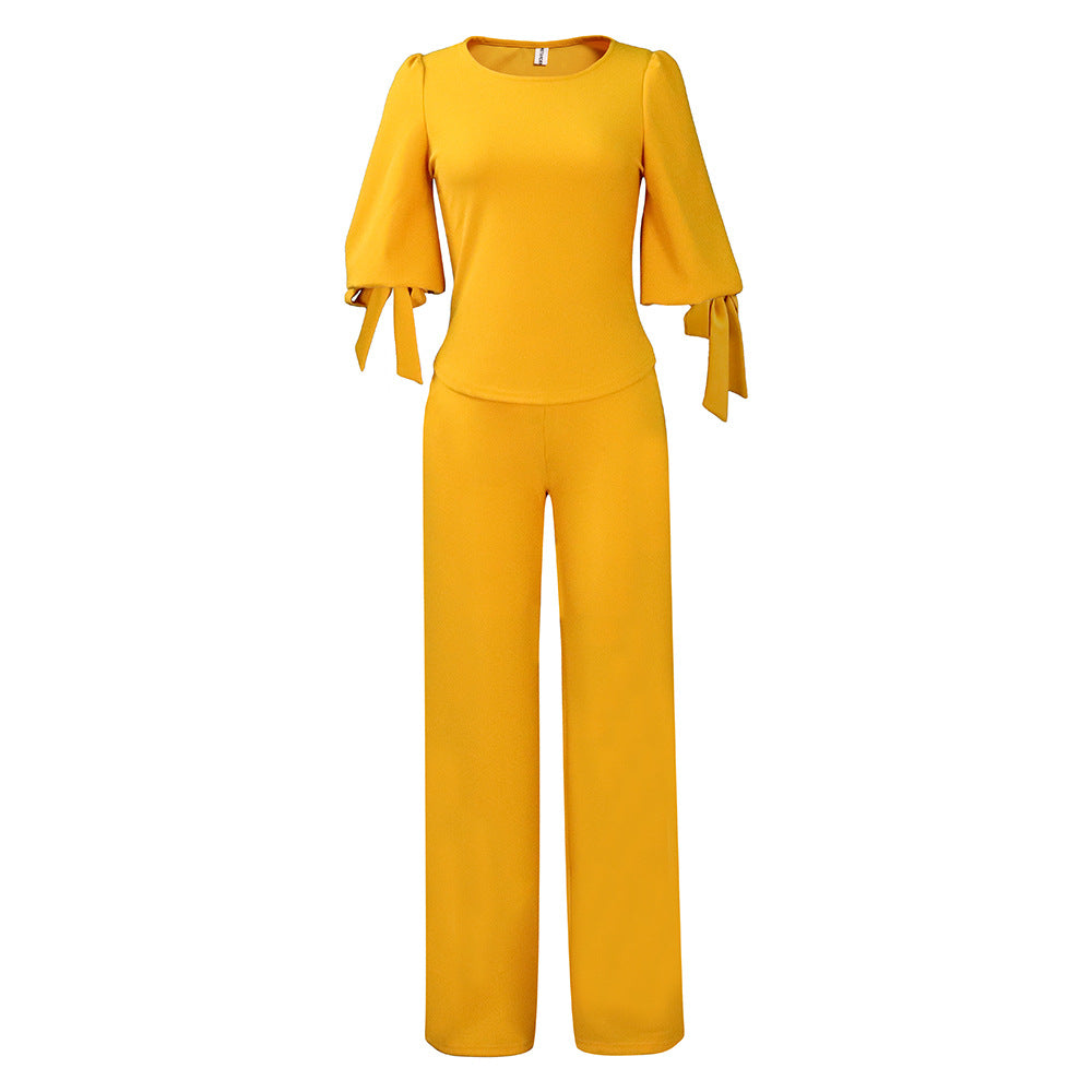 Dame Jumpsuit med dekorative ballonærmer og fleksibelt taljebælte Stilla